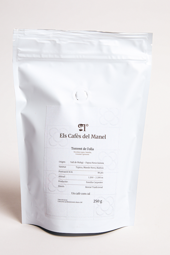 Packaging del cafè d’especialitat Torrent de l’Olla amb origen Papua Nova Guinea dels Cafès del Manel
